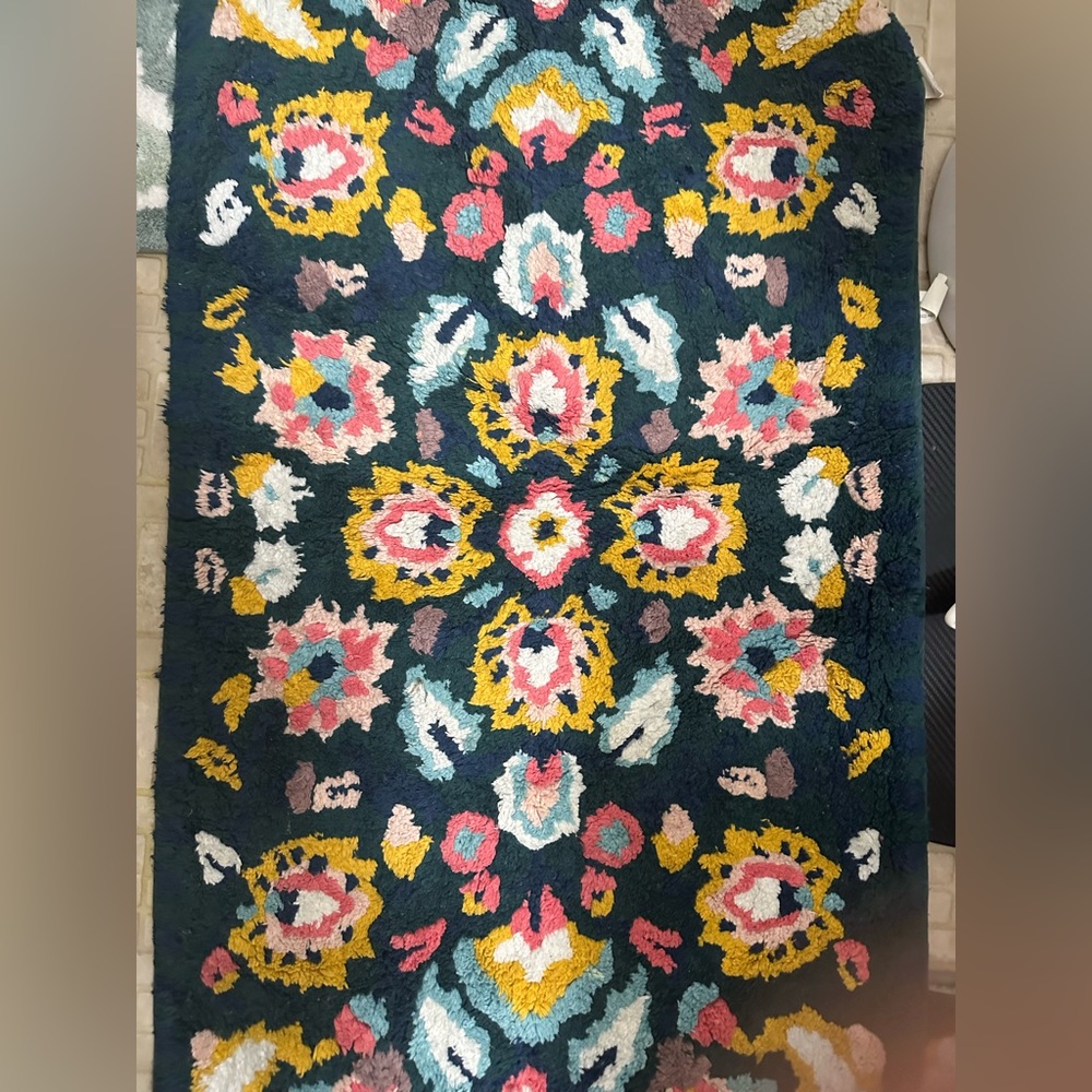 Two super cute 100% cotton bath rugs from anthropology. Very gently used.